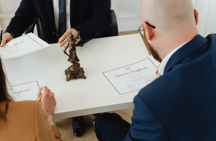 How Settlements Work: A Guide to the Legal Process Divorce certificate on the table top